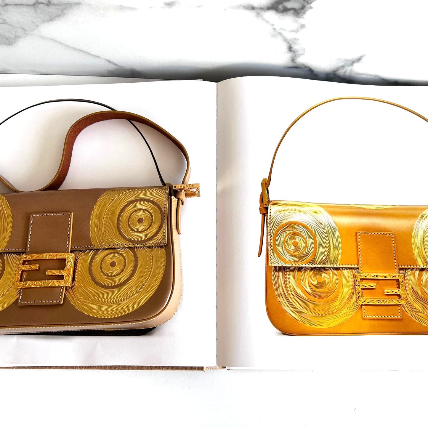 Vintage Fendi gold swirl pattern baguette from 2000-2001