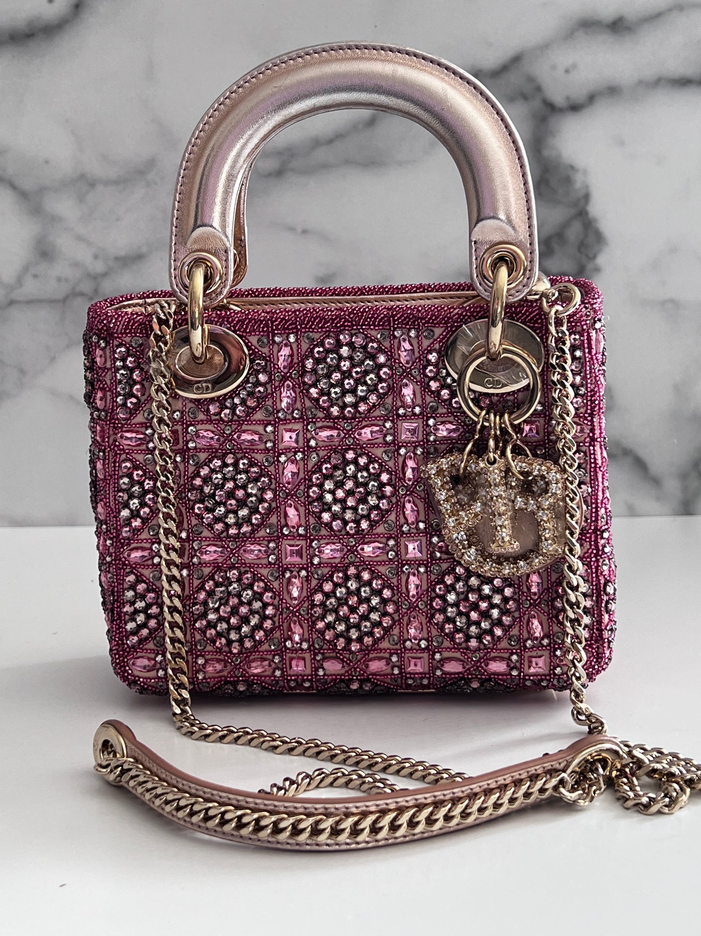 Pre-loved Mini Lady Dior Bag
Metallic Lambskin and Rose des Vents Satin Embroidered with Beads