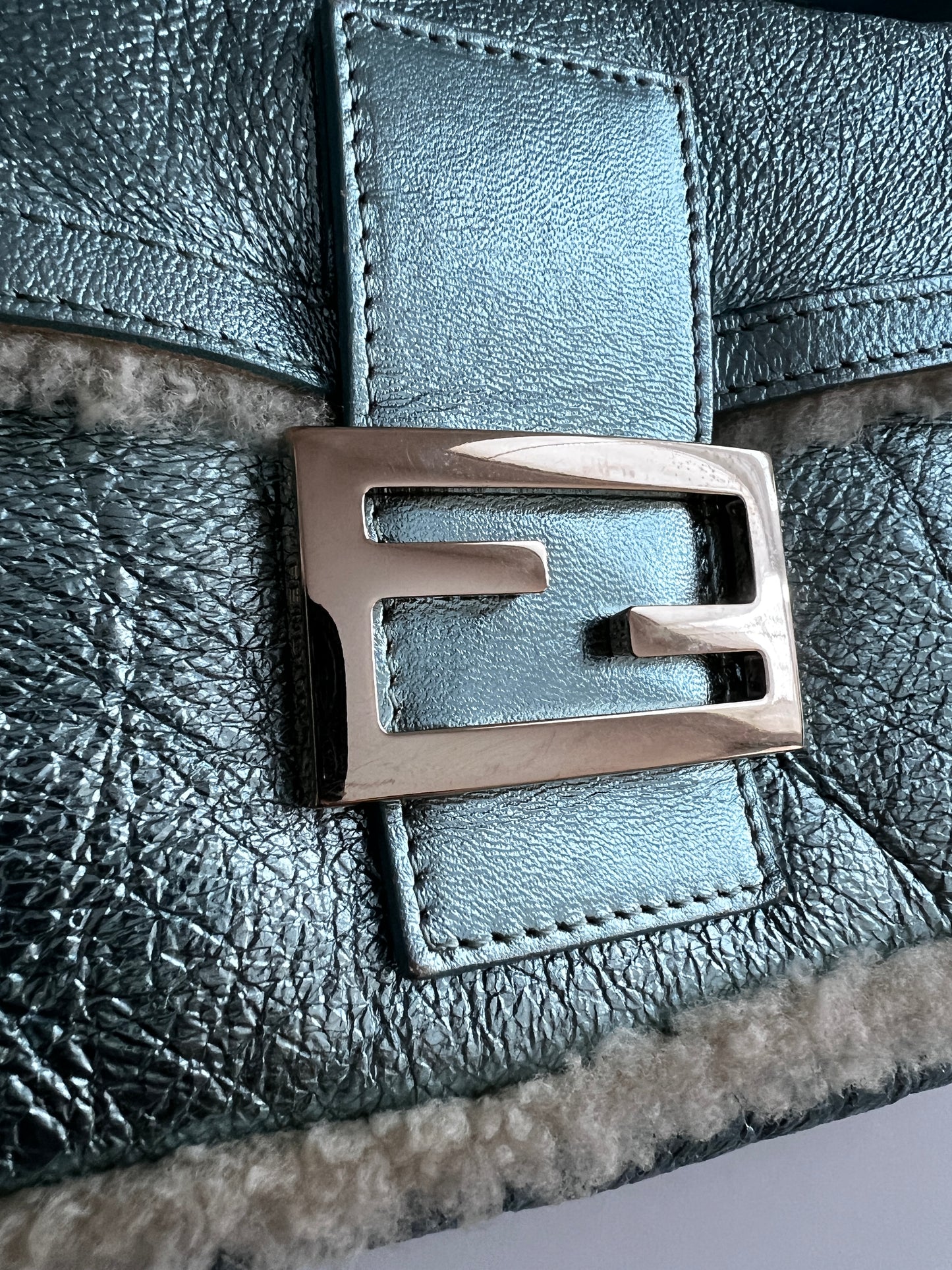 Fendi metallic ice blue shearing baguette