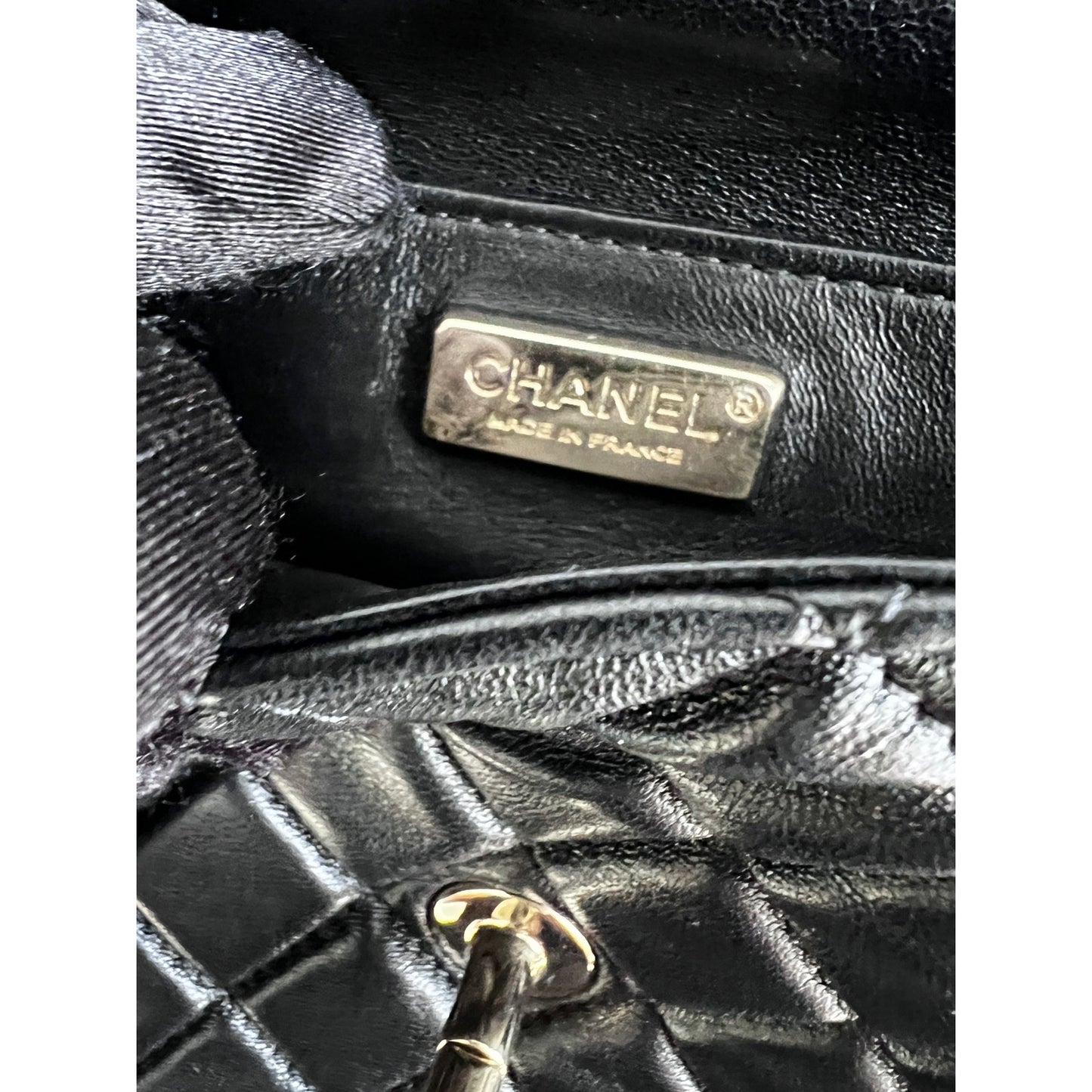 CHANEL black calfskin leather with black shearling flap bag, 2017.