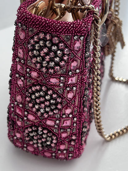 Pre-loved Mini Lady Dior Bag
Metallic Lambskin and Rose des Vents Satin Embroidered with Beads