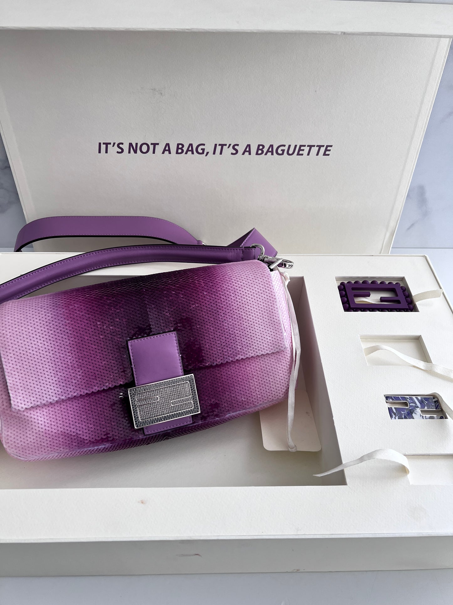 Fendi & SJP‘s purple sequin baguette
