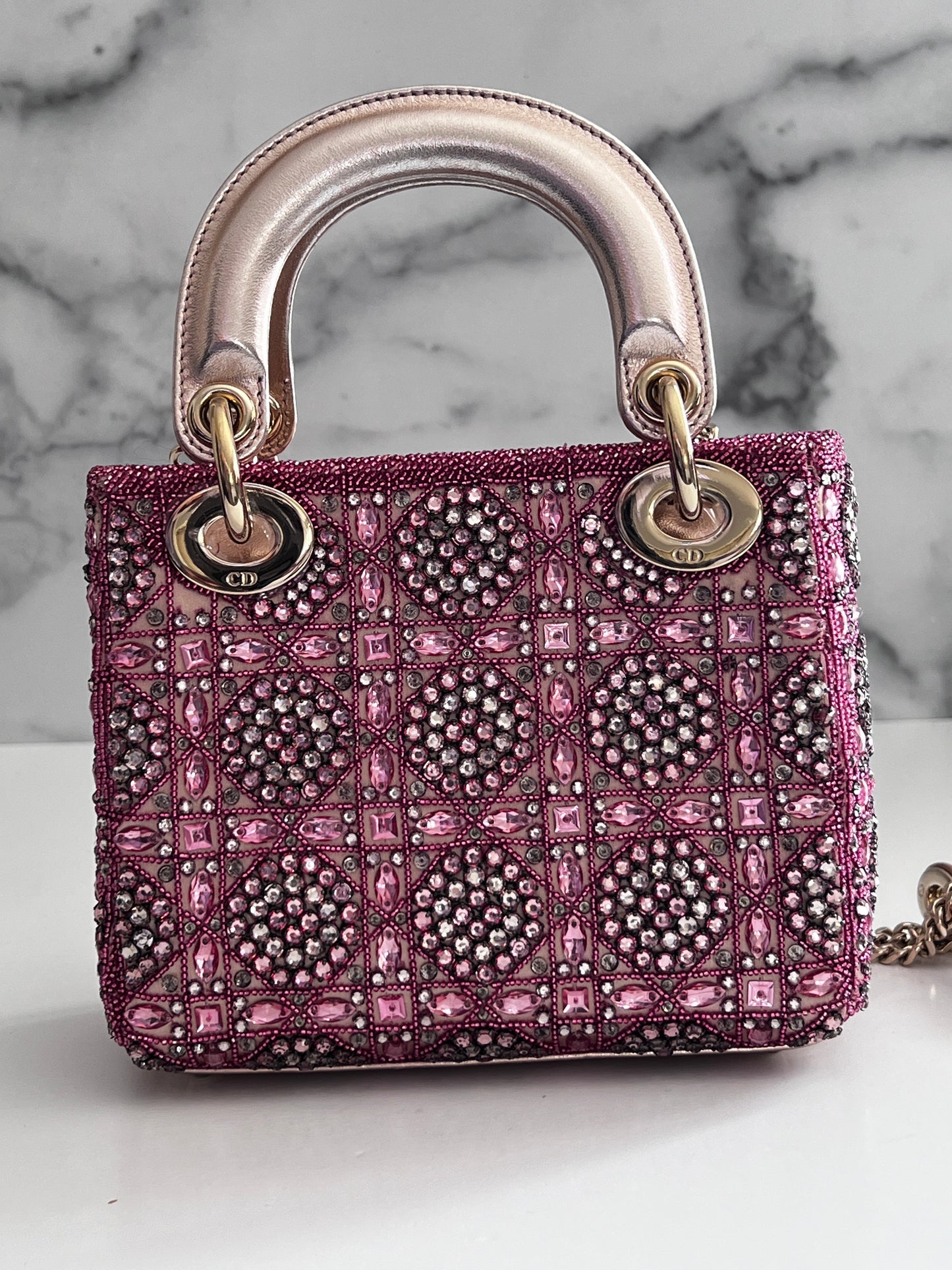 Pre-loved Mini Lady Dior Bag
Metallic Lambskin and Rose des Vents Satin Embroidered with Beads