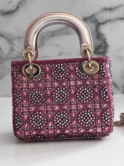 Pre-loved Mini Lady Dior Bag
Metallic Lambskin and Rose des Vents Satin Embroidered with Beads