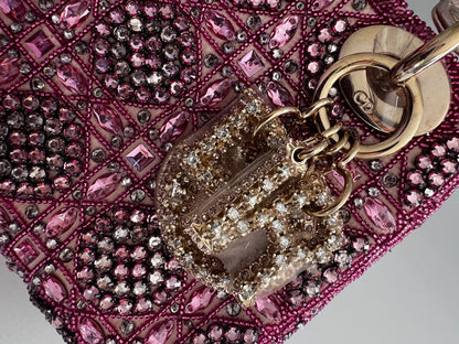 Pre-loved Mini Lady Dior Bag
Metallic Lambskin and Rose des Vents Satin Embroidered with Beads