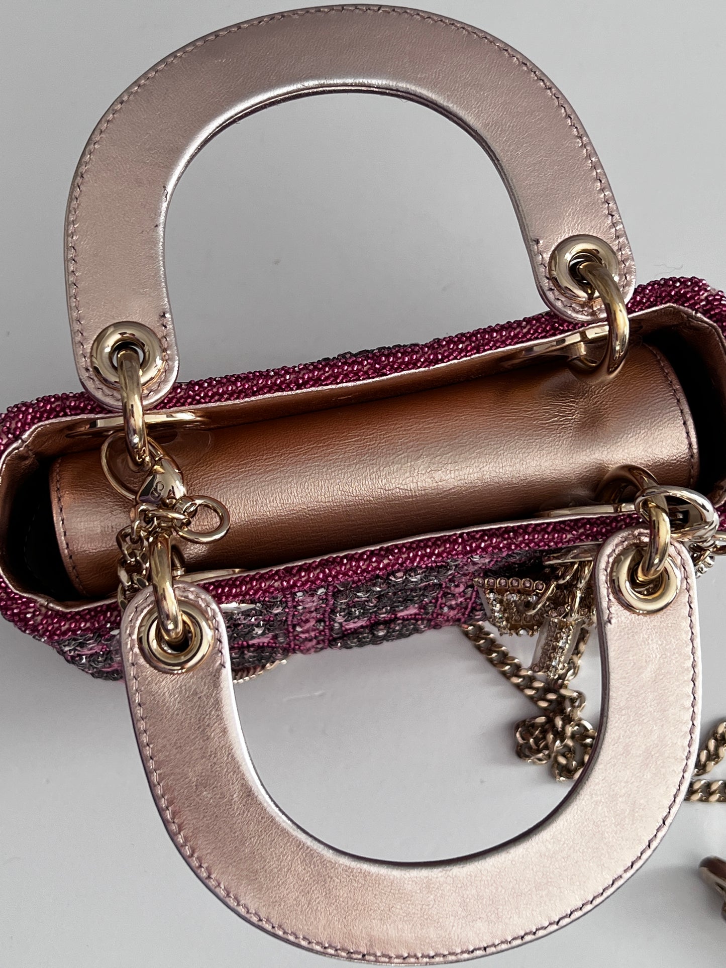 Pre-loved Mini Lady Dior Bag
Metallic Lambskin and Rose des Vents Satin Embroidered with Beads
