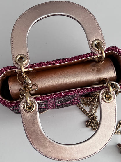 Pre-loved Mini Lady Dior Bag
Metallic Lambskin and Rose des Vents Satin Embroidered with Beads