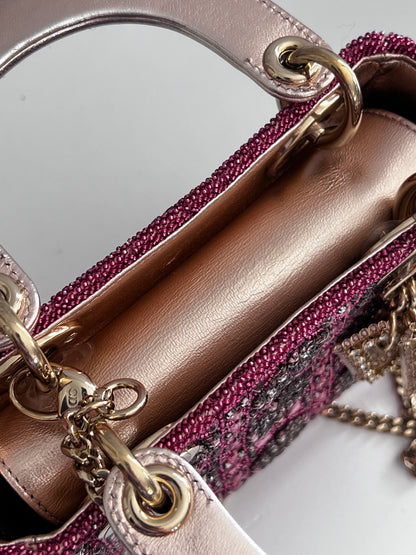 Pre-loved Mini Lady Dior Bag
Metallic Lambskin and Rose des Vents Satin Embroidered with Beads