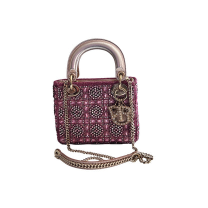 Pre-loved Mini Lady Dior Bag
Metallic Lambskin and Rose des Vents Satin Embroidered with Beads