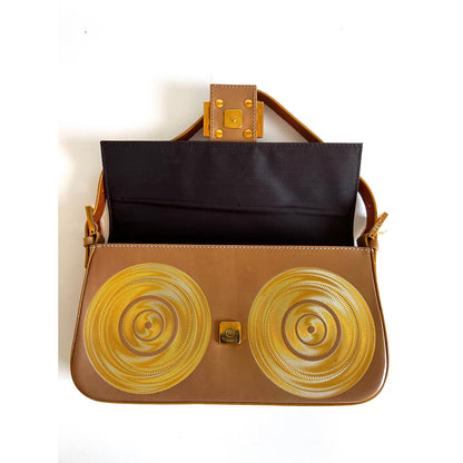 Vintage Fendi gold swirl pattern baguette from 2000-2001